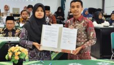 Kepala Perpustakaan USM Mulia Wati S.IP bersama Ketua FPPTI Aceh Nasrijal, S.IP (dok Humas USM)  